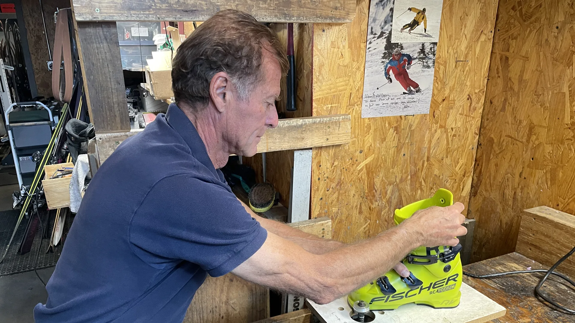 Alain grinding a ski boot sole on the canting jig at Le Ski Mastery
